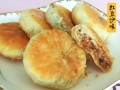 手工制作芝麻糖心千层油酥饼（家庭厨艺必学，让你尽享古早味道！）