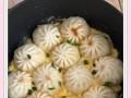 妙手制作猪肉馅生煎包（口感鲜美、外脆内嫩的家常早餐）