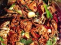 香辣小河蟹的制作方法（从采购到烹饪，教你制作美味香辣小河蟹）