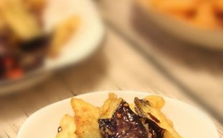 酥炸茄子的制作秘诀（让茄子变得松脆美味的小技巧）