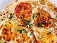 如何制作美味的洋葱圈煎蛋（掌握煎蛋技巧，让洋葱更美味）