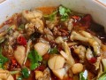 水煮牛蛙的做法剖析（从选材到上桌，教你做一份美味的水煮牛蛙）