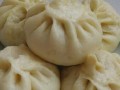 煎香葱猪肉包子的做法（让你轻松在家制作美味包子）