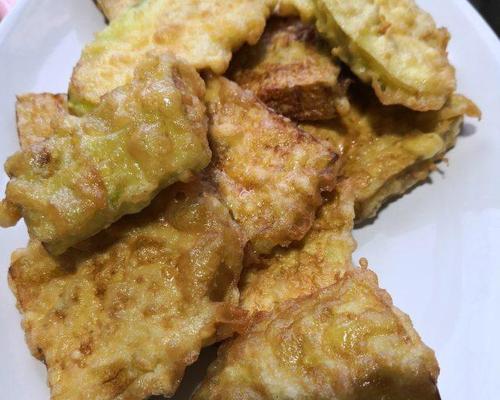 酥炸茄子的制作秘诀（让茄子变得松脆美味的小技巧）-第3张图片-美味行家