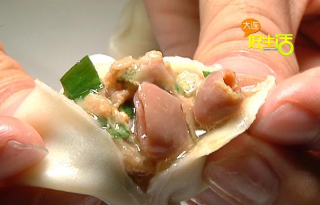 品尝鲜美扇贝饺子（自制扇贝饺子的制作方法和口感推荐）-第1张图片-美味行家