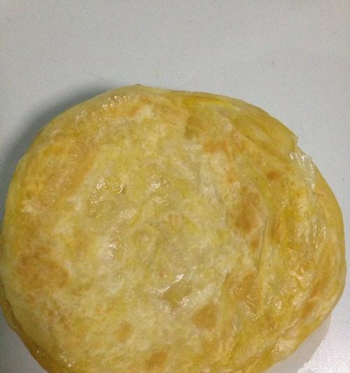 油饼的制作方法（掌握制作油饼的技巧，做出口感酥脆的美食）-第3张图片-美味行家