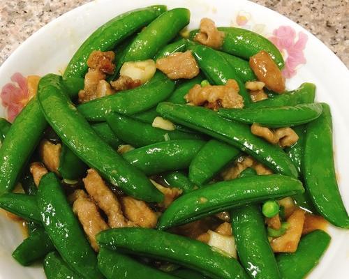 美味又健康，甜豆炒牛肉丸的制作方法（美食佳肴，做饭新体验；健康养生，一口咬下的美好）-第1张图片-美味行家