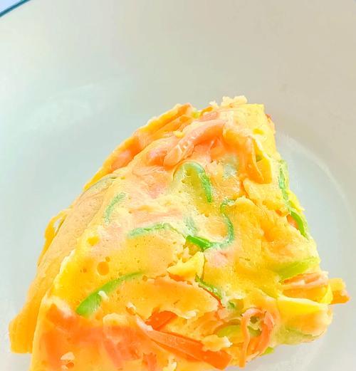 美味可口的以西葫芦胡萝卜丝鸡蛋饼（轻松学做，让你体验不一样的美食体验）-第1张图片-美味行家