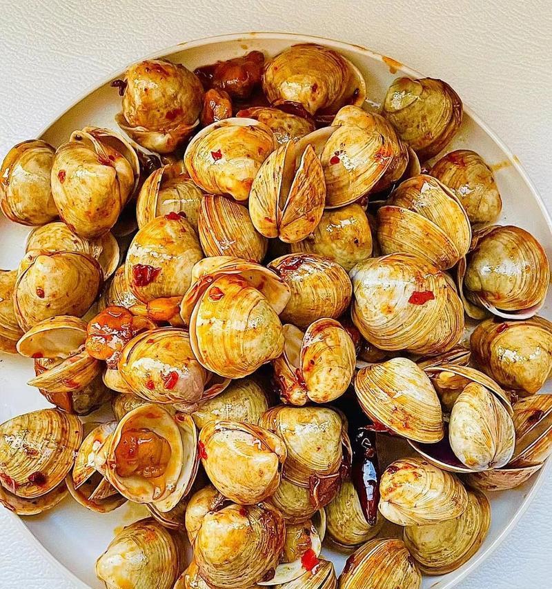 以水煮大蚬子，品尝鲜美海味（做法简单易学，汁香味美，让你一次尝尽海鲜美味）-第1张图片-美味行家
