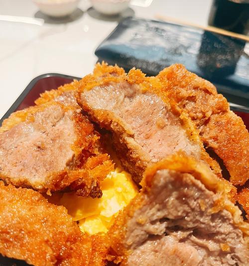 日式猪扒饭的制作方法（教你如何制作美味的日式猪扒饭）-第1张图片-美味行家