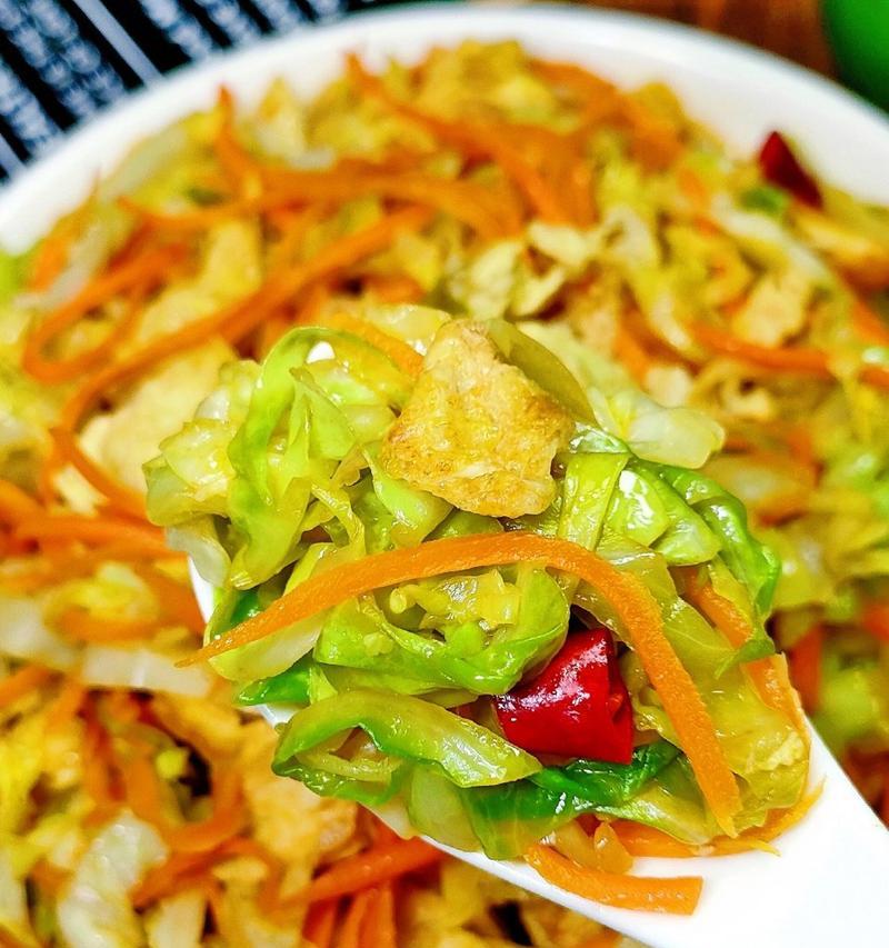 学会制作美味的圆白菜炒蛋（快速简单的家常菜肴，营养又美味）-第1张图片-美味行家