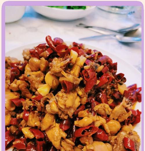 学会制作缤纷麻辣鸡丁的秘诀（揭秘麻辣鸡丁的制作方法，做出色香味俱佳的美食佳品）-第3张图片-美味行家
