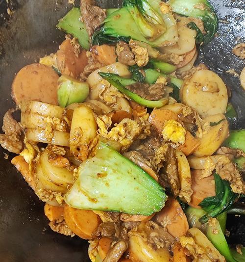 简单易学，味道美妙的白菜炒年糕（白菜与年糕的完美结合，让你爱上家庭料理）-第3张图片-美味行家
