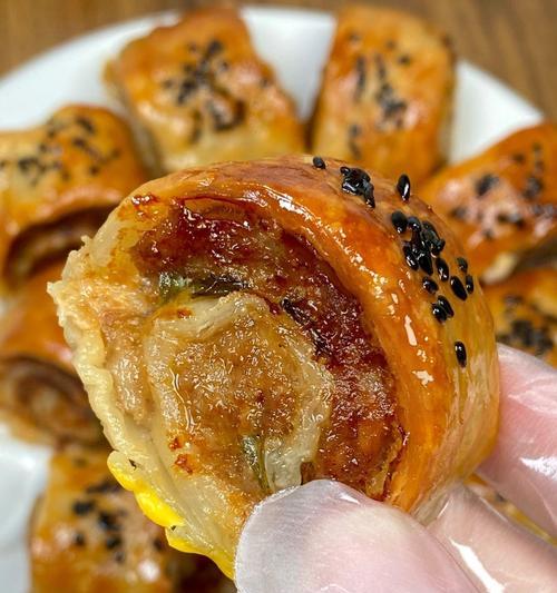 手抓饼卷的做法（一步一步教你制作美味可口的手抓饼卷）-第3张图片-美味行家