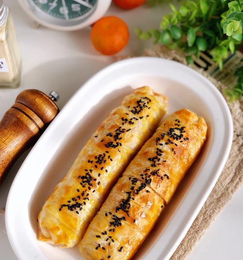 手抓饼培根肉松卷的制作（打造美味健康的早餐菜品，享受美好生活）-第2张图片-美味行家