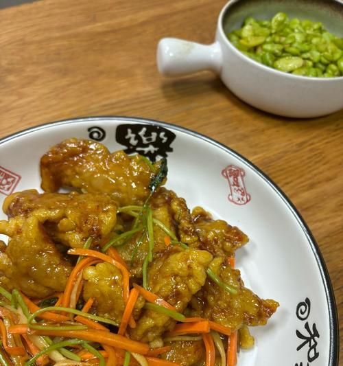吉锅包肉的正宗做法（掌握吉锅包肉制作技巧，享受地道美味）-第1张图片-美味行家