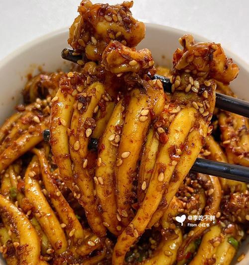 以孜然鱿鱼头为主角的美食之旅（探寻孜然鱿鱼头的奥秘与魅力）-第1张图片-美味行家