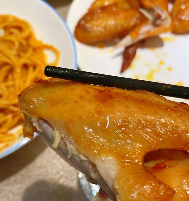 学会制作美味的新奥尔良烤全翅带辣味（尝试一下这种美味佳肴，享受美好生活）-第1张图片-美味行家