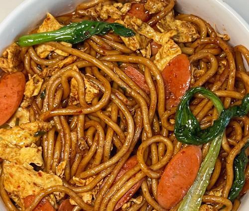如何制作美味的炒面饼（掌握关键步骤，制作出口感好的炒面饼）-第1张图片-美味行家