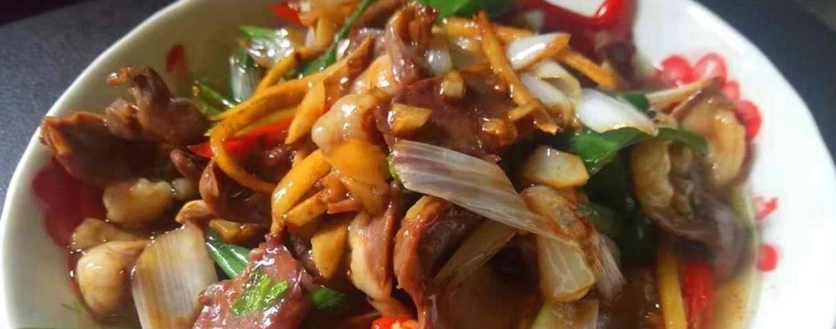 香嫩洋葱爆猪心（传统美食的独特味道，让你难以忘怀）-第1张图片-美味行家