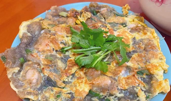 潮汕生蚝烙，美味不可错过（探秘潮汕小吃中的瑰宝——生蚝烙的做法和口感）-第1张图片-美味行家